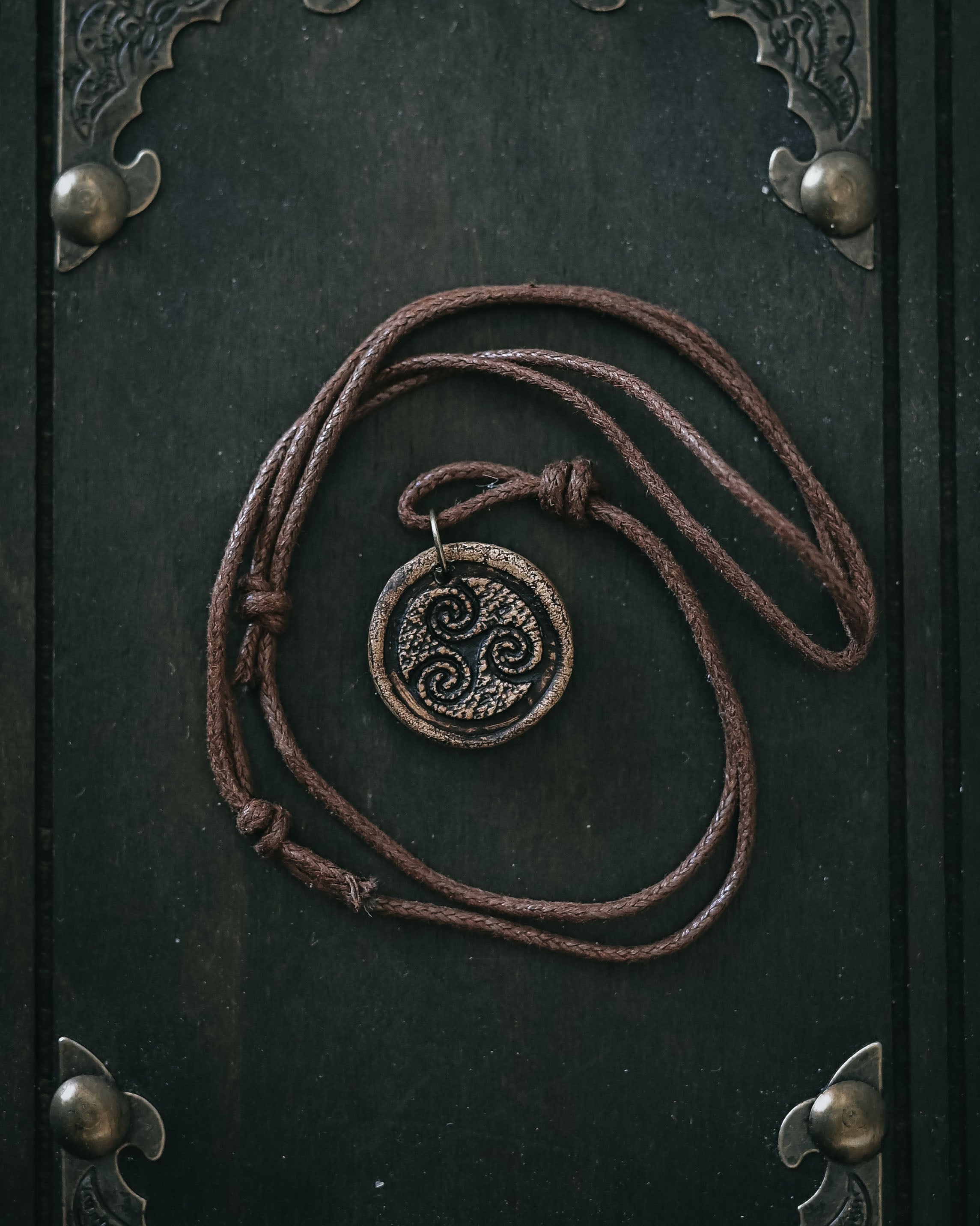 Handmade Ceramic Triskelion Pendant – Celtic Spiral of Life
